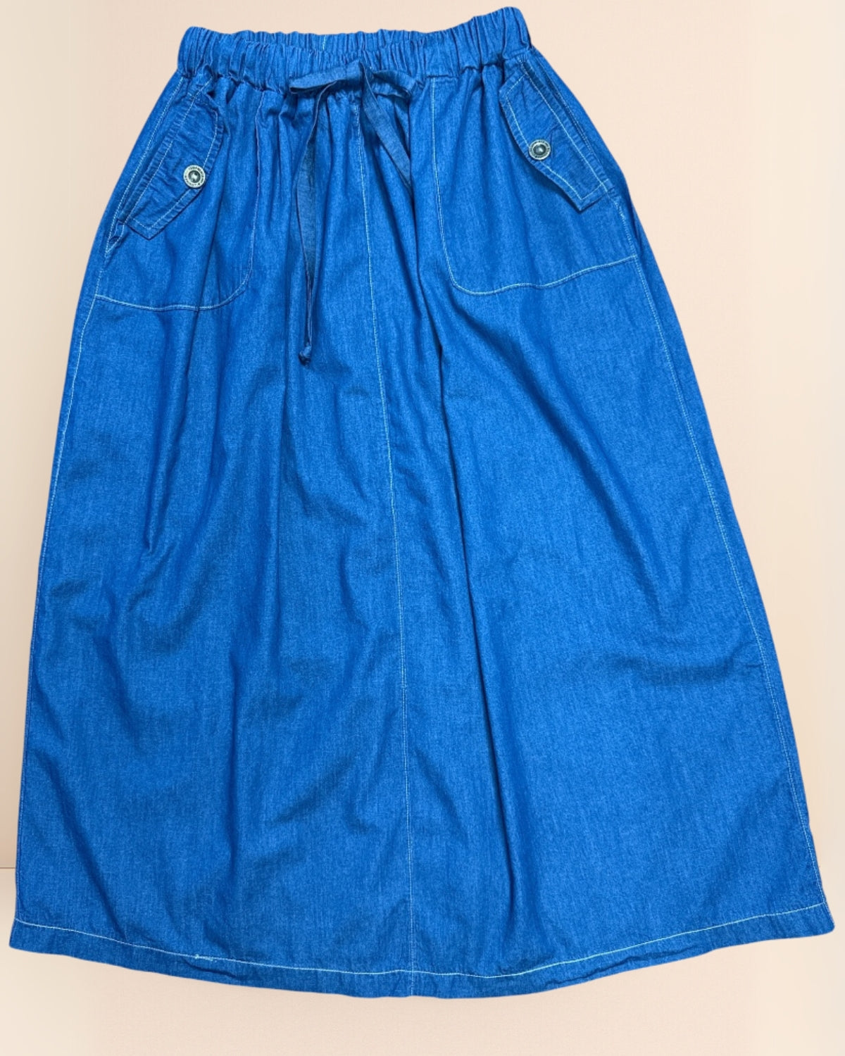 Falda de mezclilla con resorte y bolsillos – Cómoda y femenina